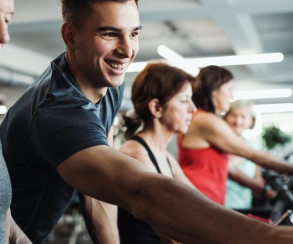 a-group-of-seniors-in-gym-with-a-young-trainer-doi-DEA8RN5-1-1500x630